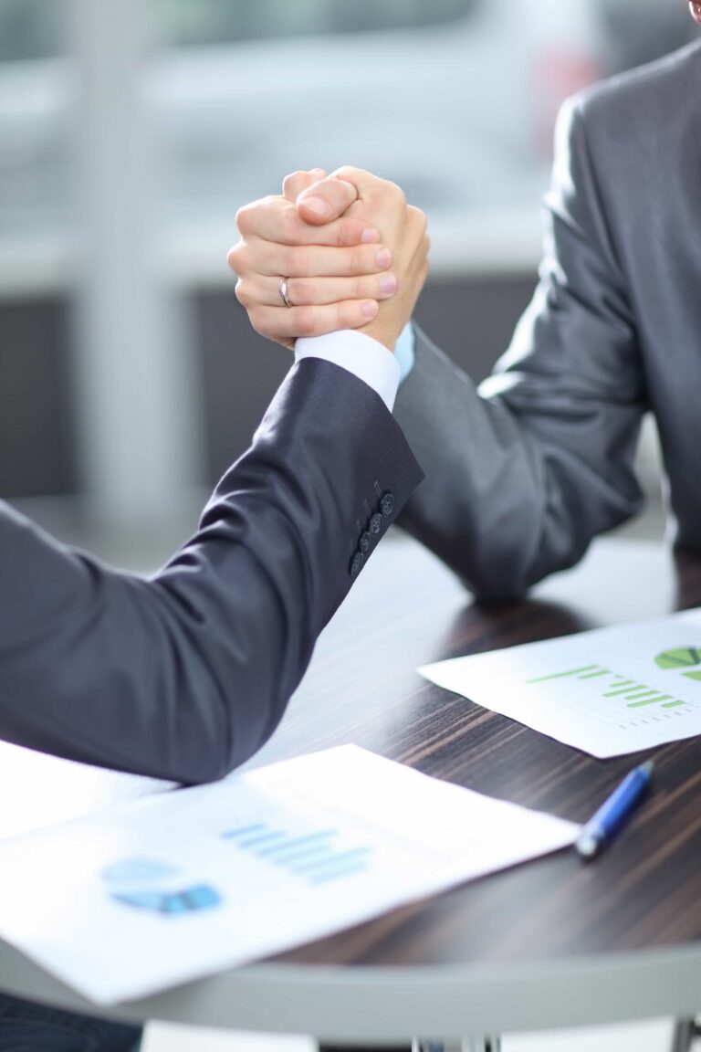 concept of a reliable partnership.the handshake business partners